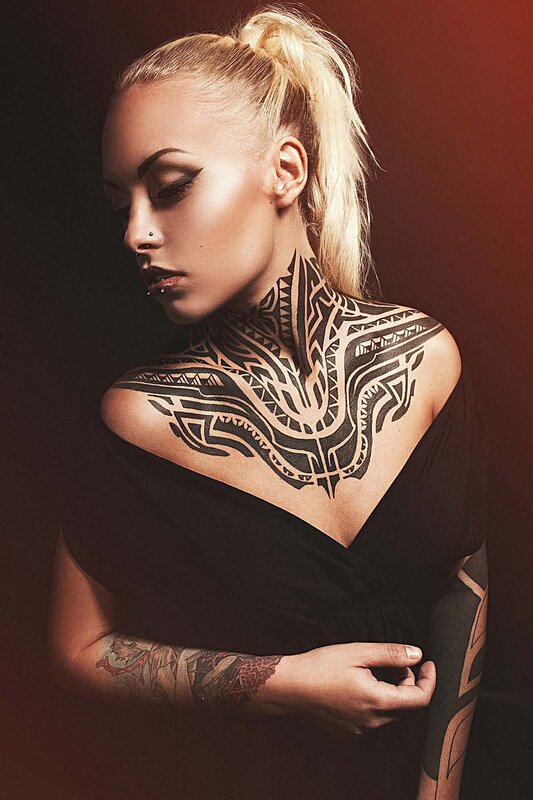 woman with tribal tattoos