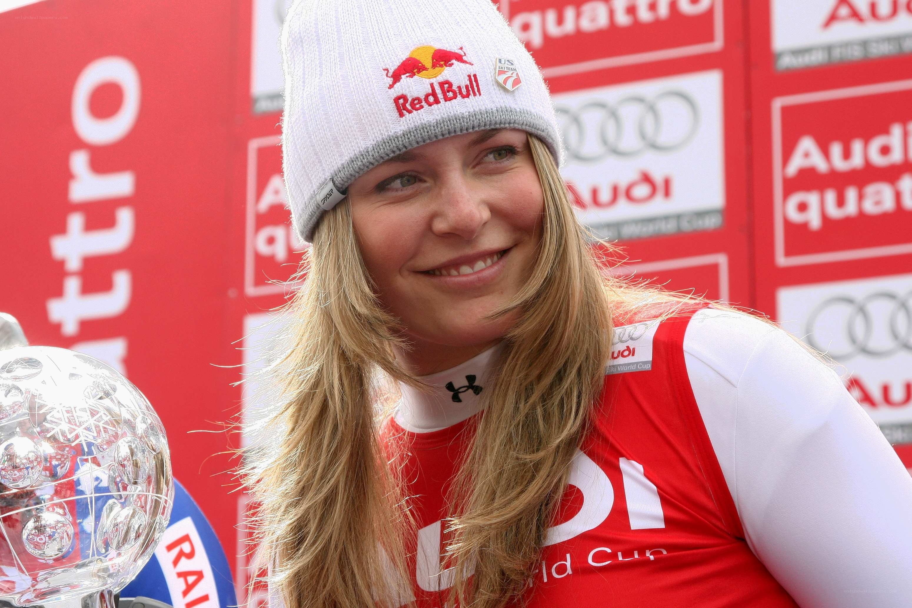 woman with trophy at event