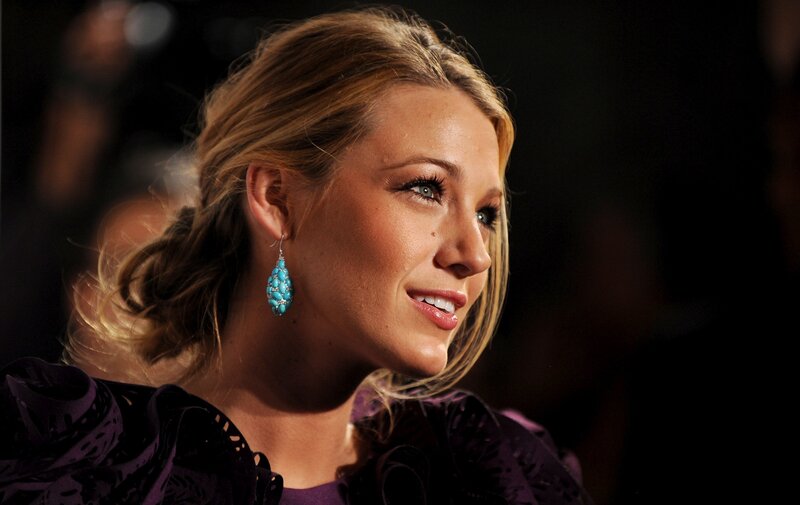 woman with turquoise earrings