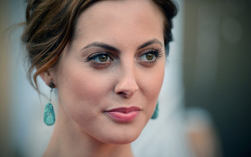 woman with turquoise earrings