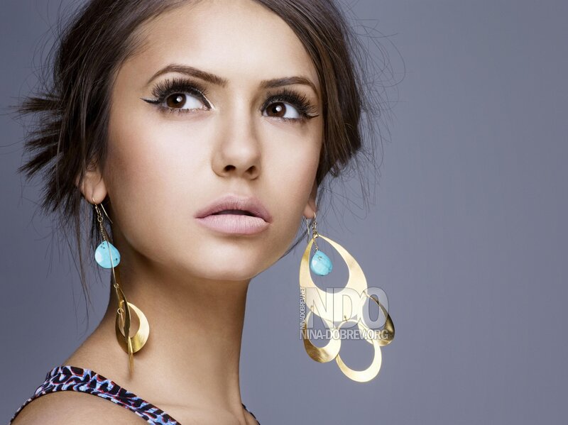 woman with turquoise earrings