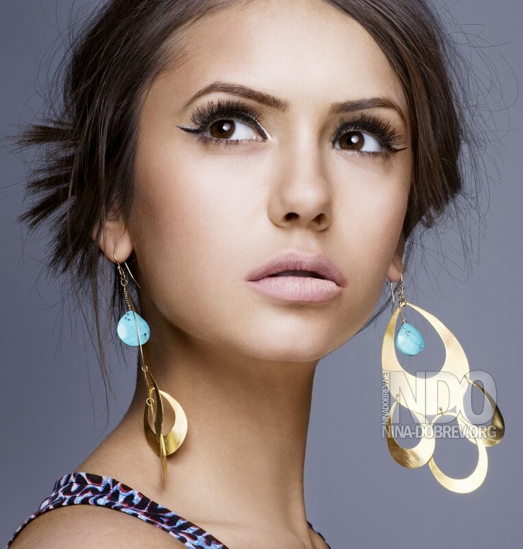 woman with turquoise earrings
