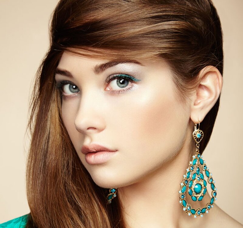 Woman with Turquoise Earrings — Brown, Neutral
