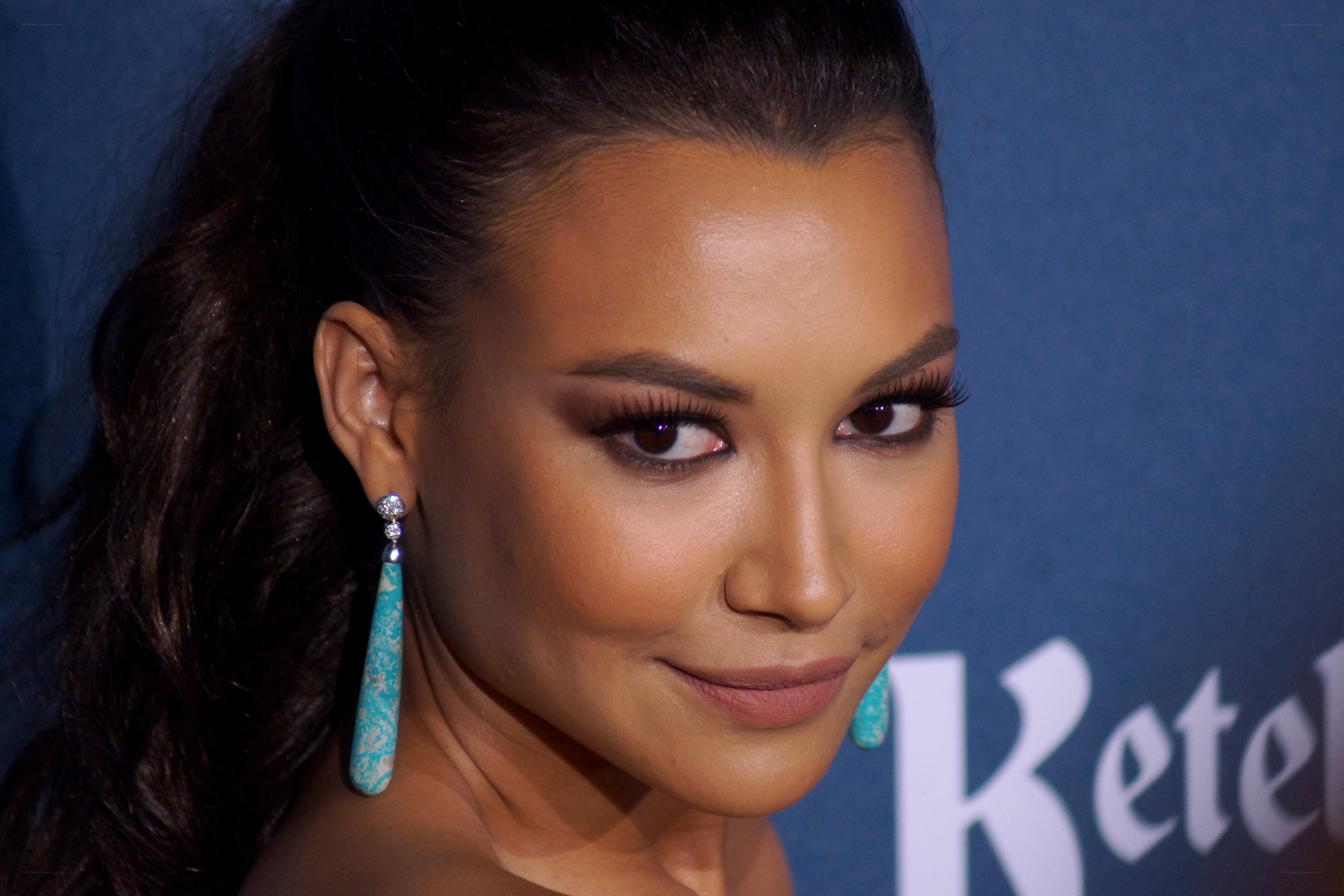 woman with turquoise earrings