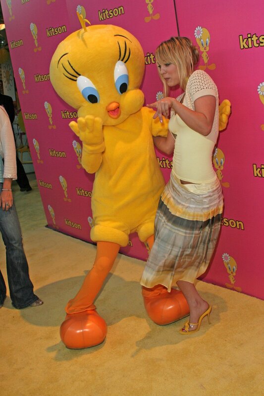 Woman with Tweety Bird mascot