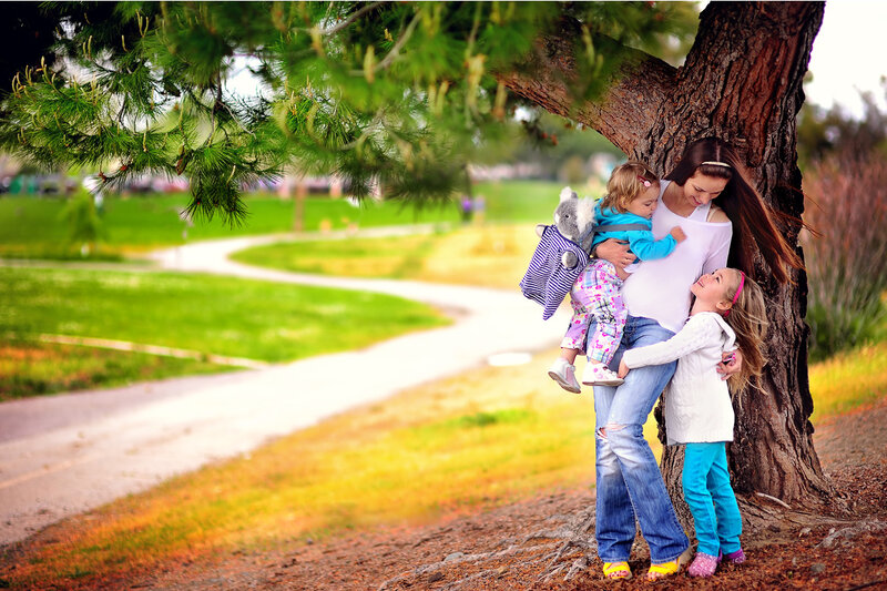 Woman with Two Children — Green, Serene, Afternoon
