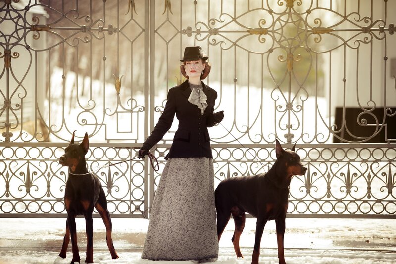 Woman with Two Dogs — Black, Dramatic, Winter, Photograph