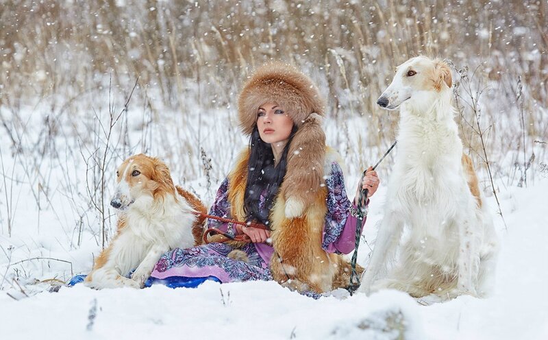 Woman with Two Dogs — White, Serene, Winter, Photograph