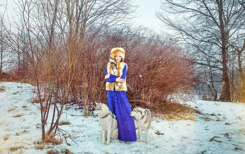 Woman with Two Huskies — Blue, Serene, Winter, Photograph