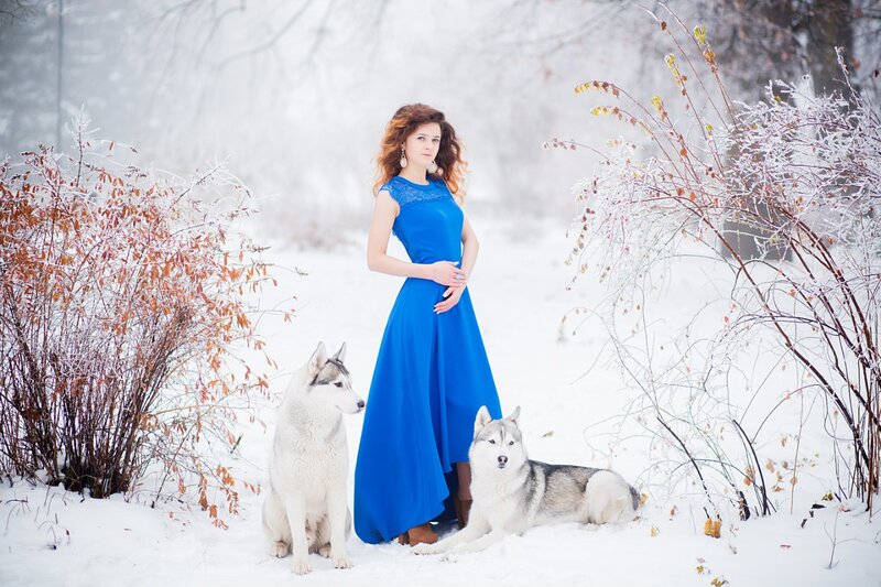 Woman with Two Huskies — Blue