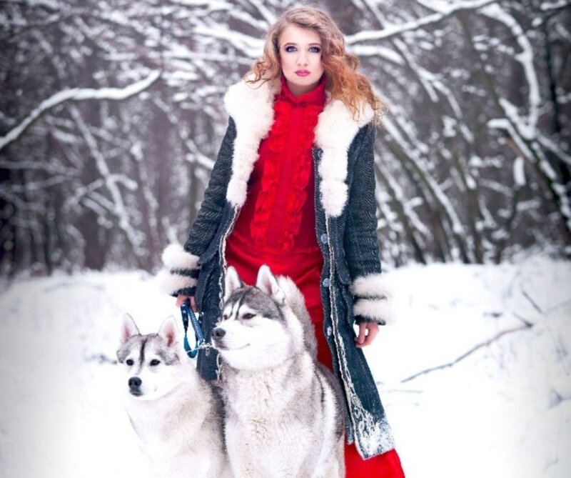 Woman with Two Huskies — White, Serene