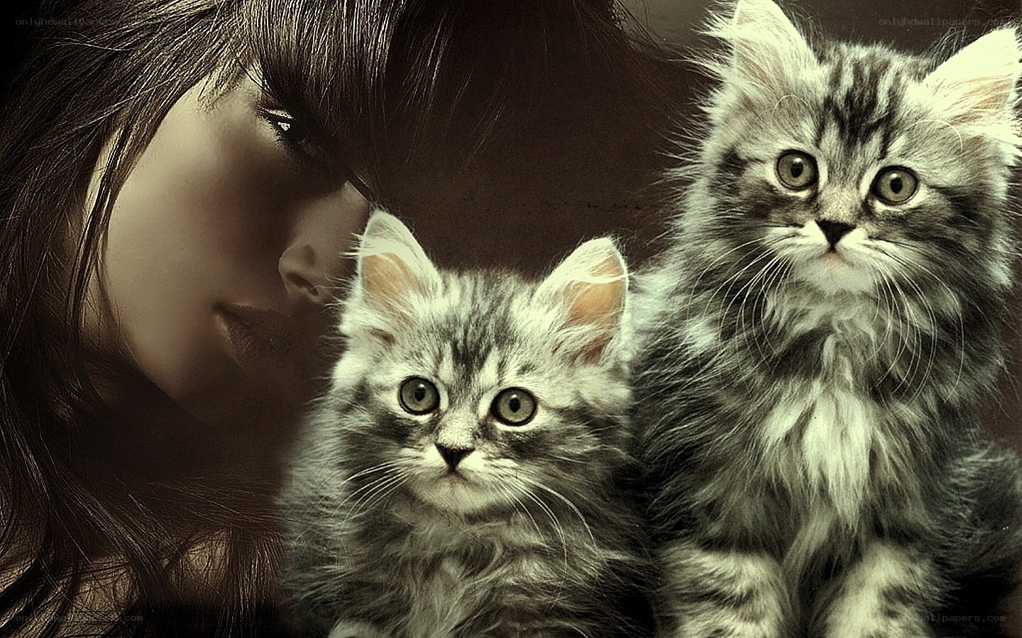 woman with two kittens