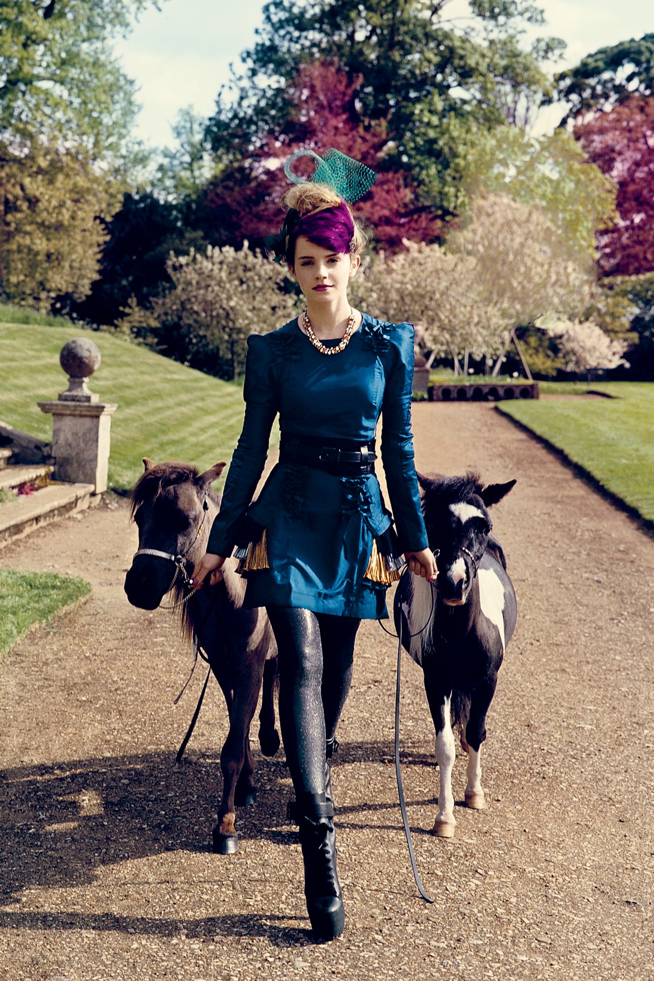 woman with two ponies