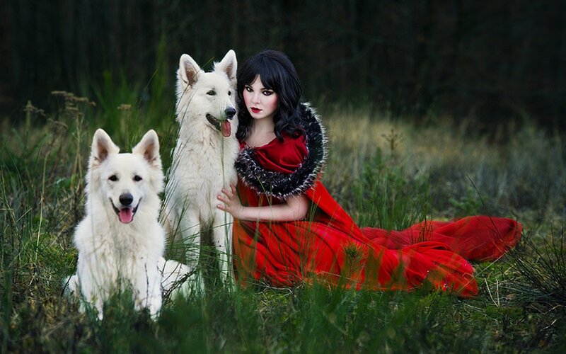 Woman with Two White Dogs
