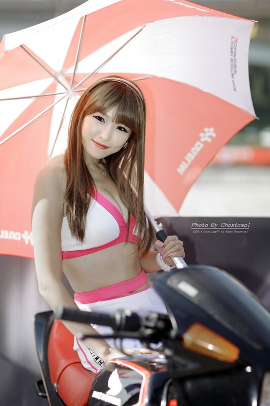 woman with umbrella and motorcycle