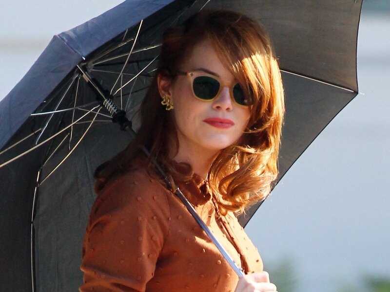 Woman with Umbrella — Brown