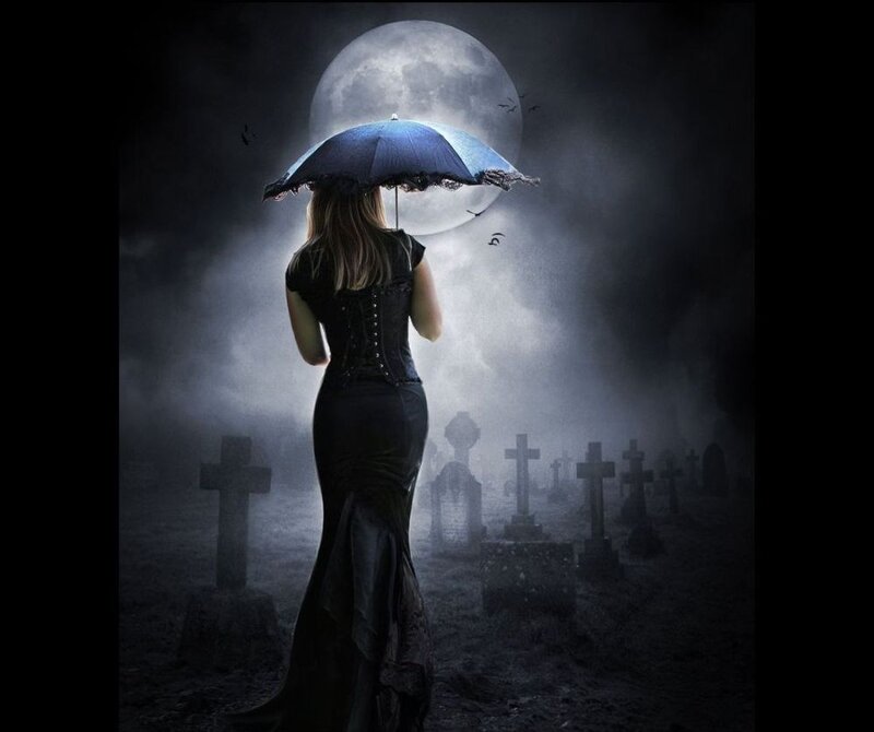 Woman with Umbrella in Cemetery