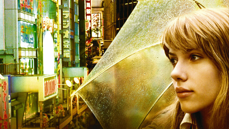 woman with umbrella in city