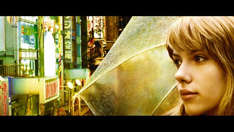 woman with umbrella in city