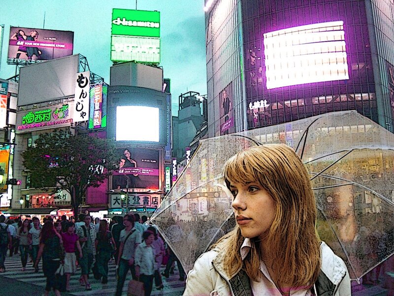 Woman with umbrella in city