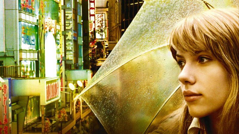 woman with umbrella in city