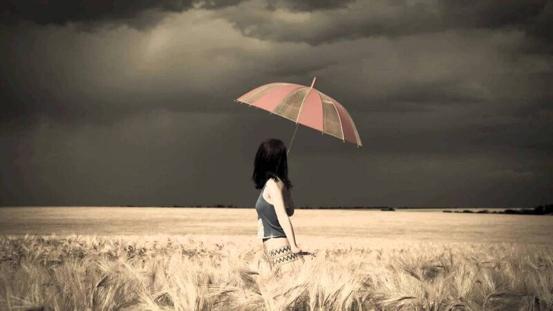 Woman with Umbrella in Field — Gray