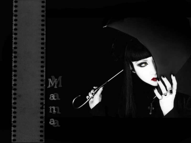 woman with umbrella in goth style