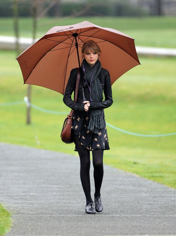 woman with umbrella in park