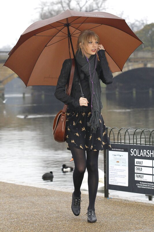 woman with umbrella in rain