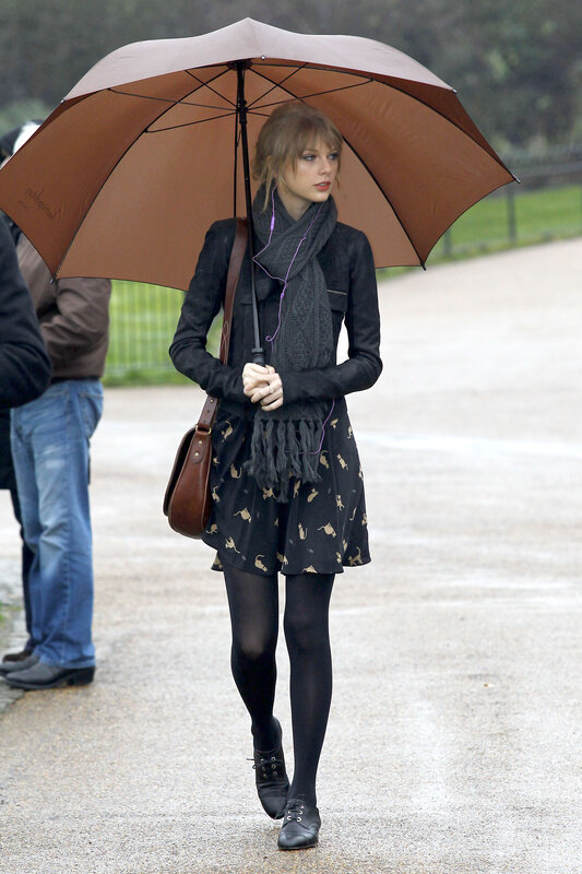 woman with umbrella in rain