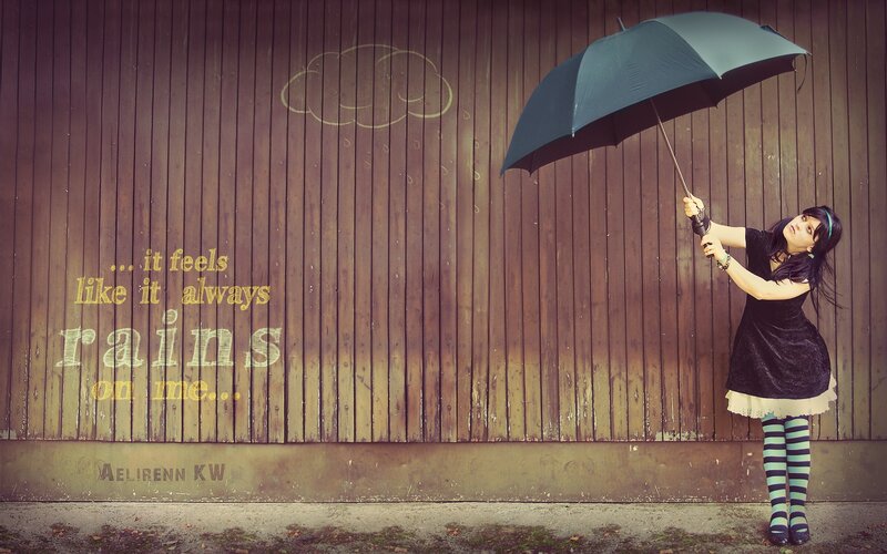 woman with umbrella in rain