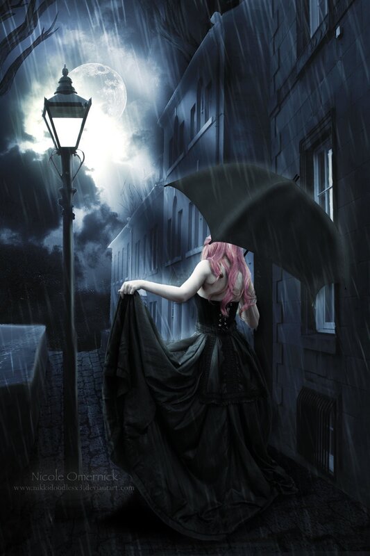 Woman with umbrella in rain