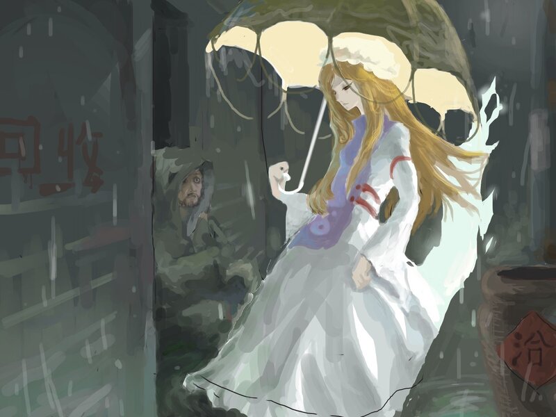 Woman with umbrella in rain