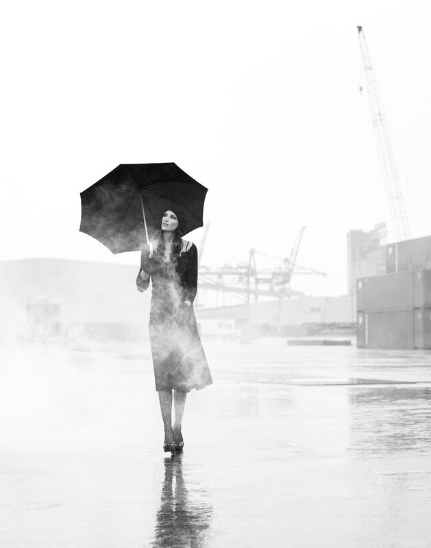 woman with umbrella in rain