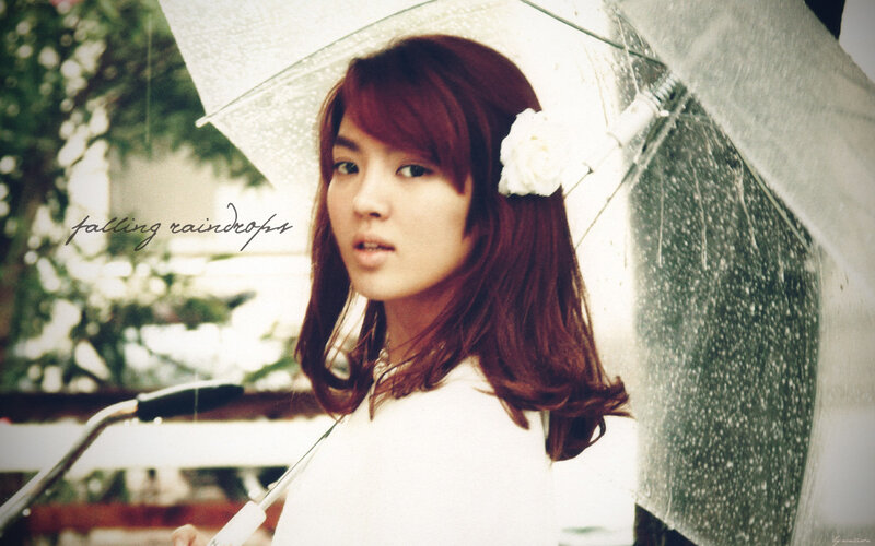 woman with umbrella in rain