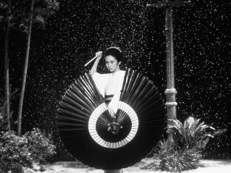 Woman with umbrella in rain
