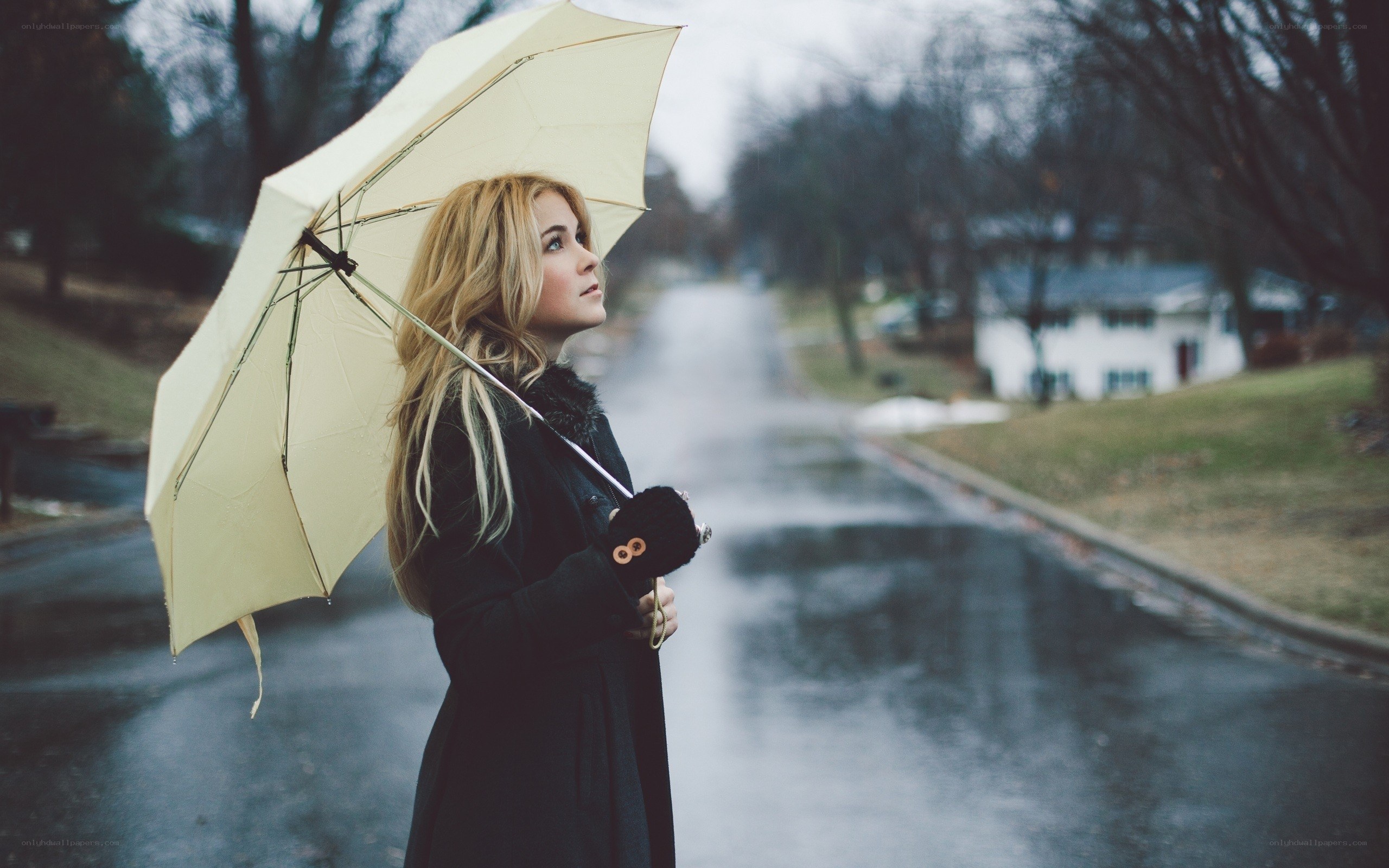 woman with umbrella in rain