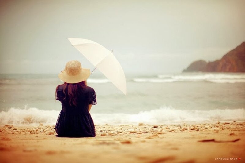 Woman with Umbrella on Beach — Beige