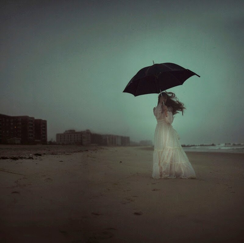 Woman with Umbrella on Beach — Gray