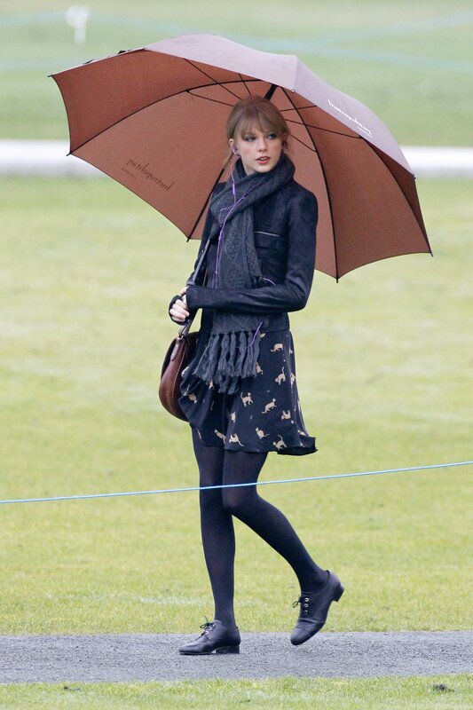 woman with umbrella walking