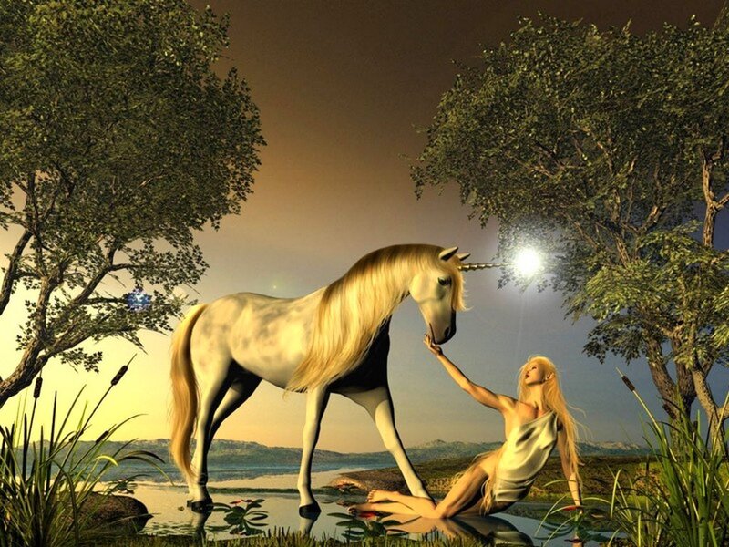 woman with unicorn at dusk