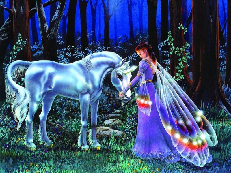 woman with unicorn in forest