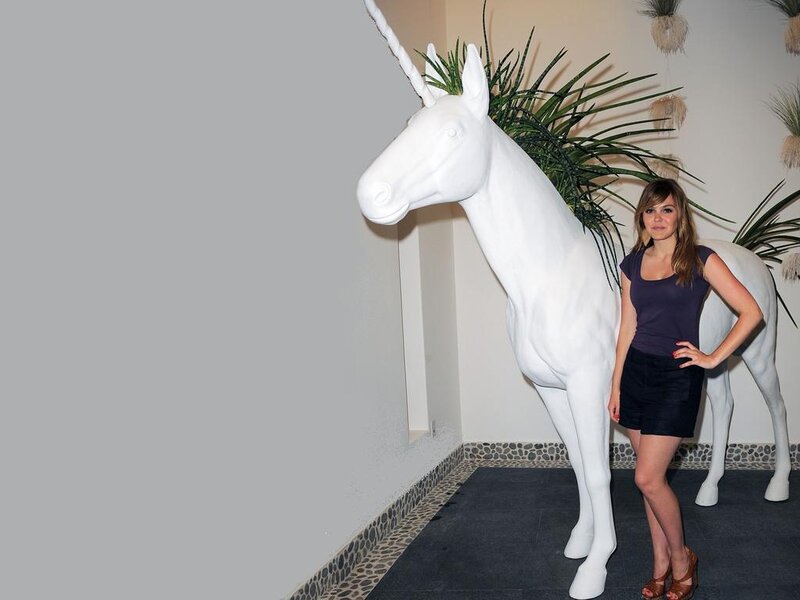 Woman with Unicorn Statue