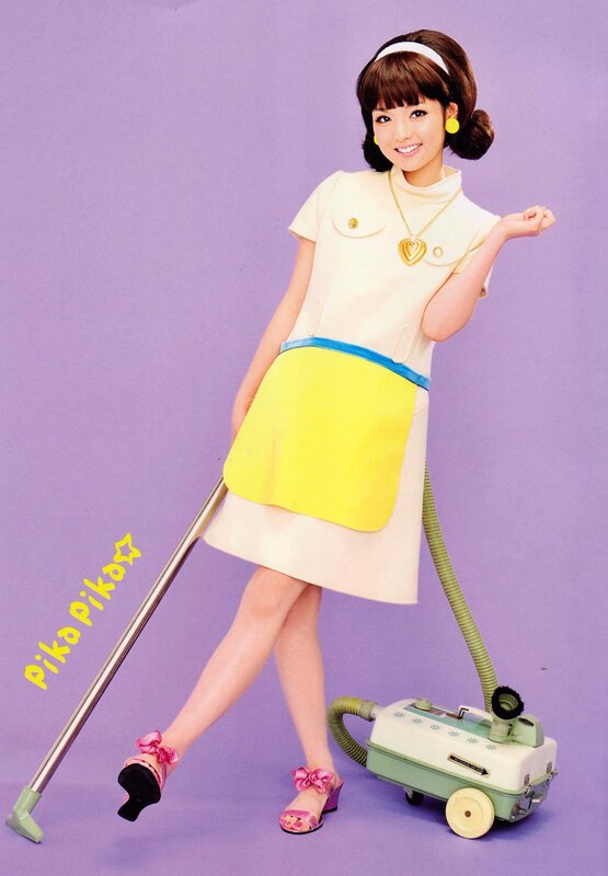 Woman with vacuum cleaner