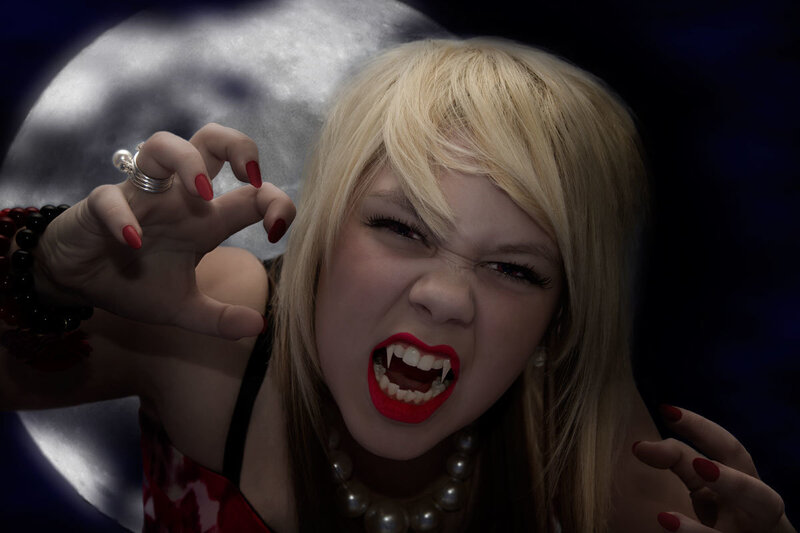 Woman with Vampire Fangs — Black, Dramatic, Night