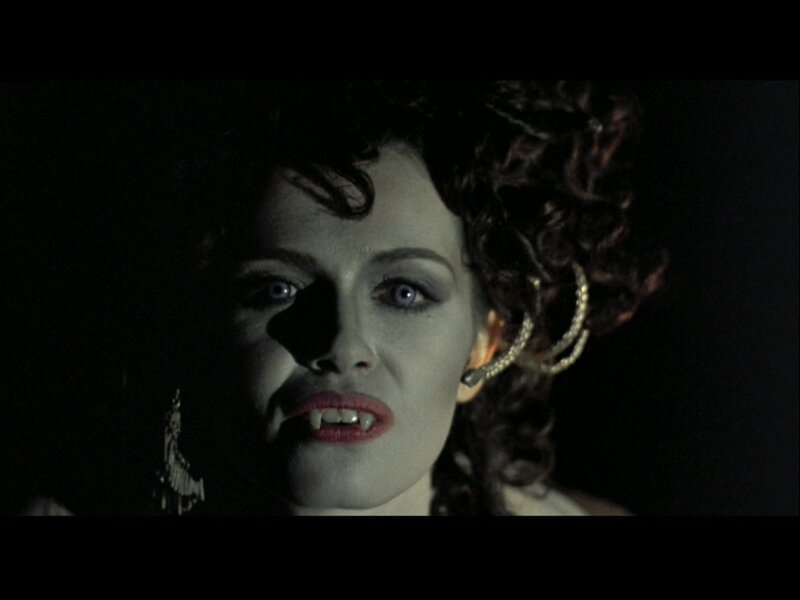 Woman with Vampire Fangs — Black, Dramatic