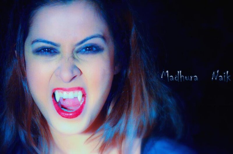 Woman with Vampire Fangs — Blue