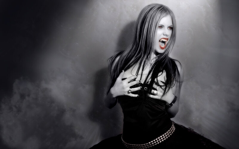 woman with vampire makeup