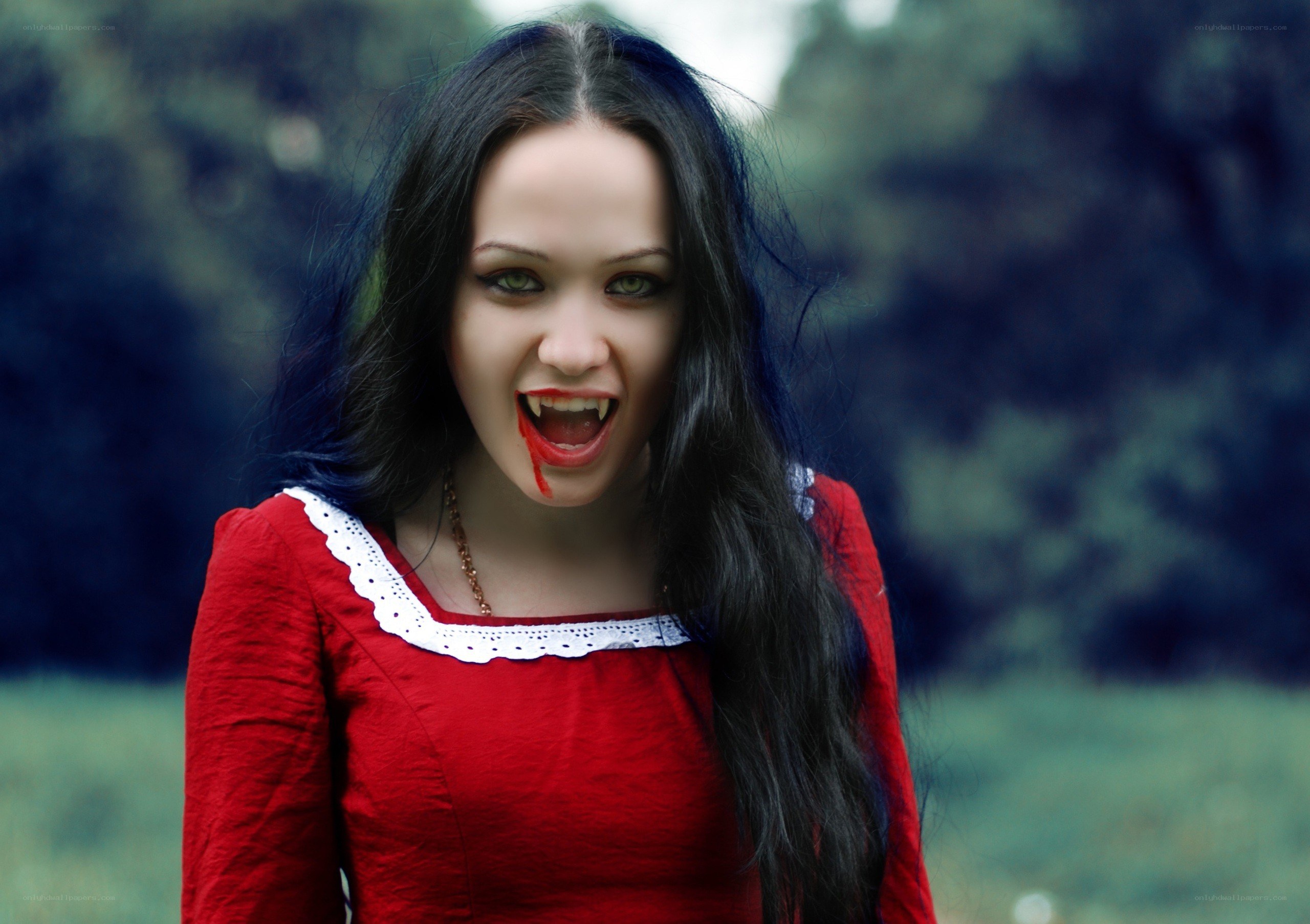 woman with vampire makeup