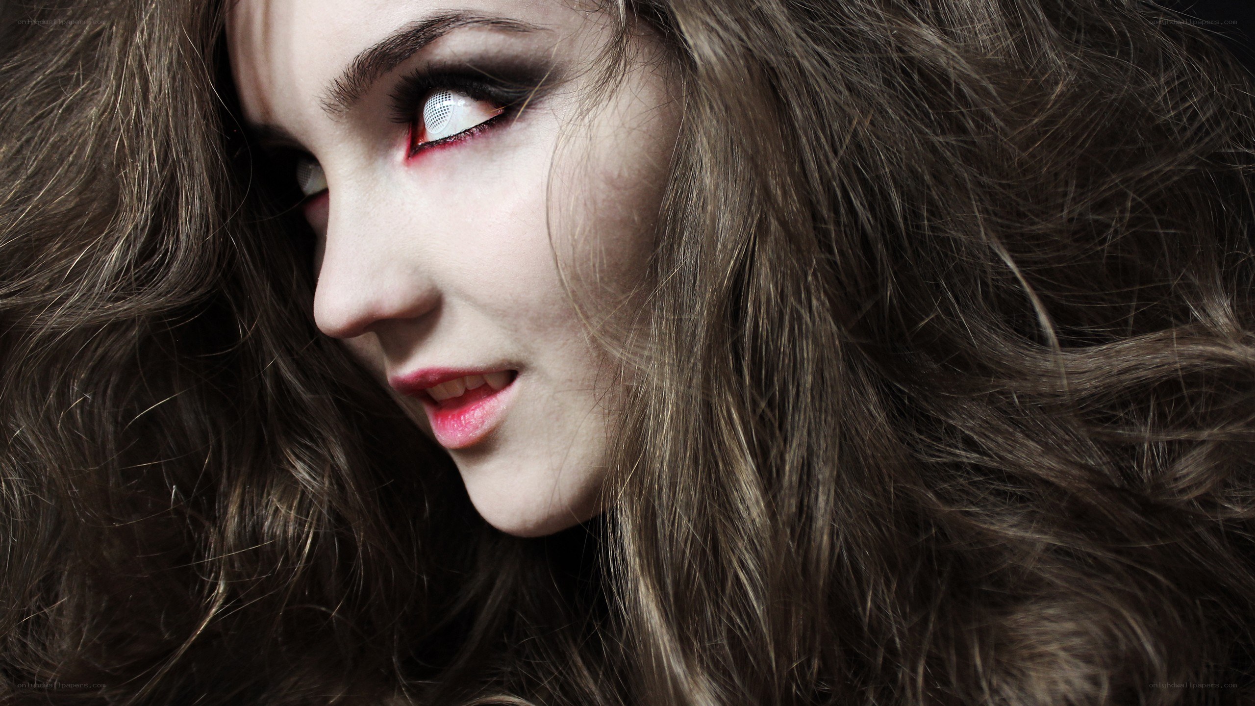 woman with vampire makeup